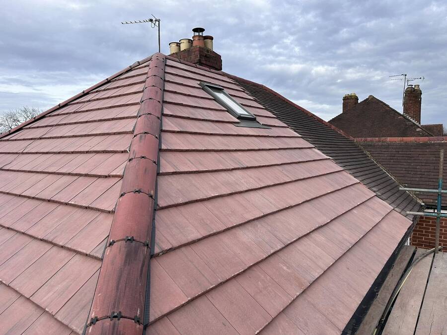 Completed roof with new tiles and skylight