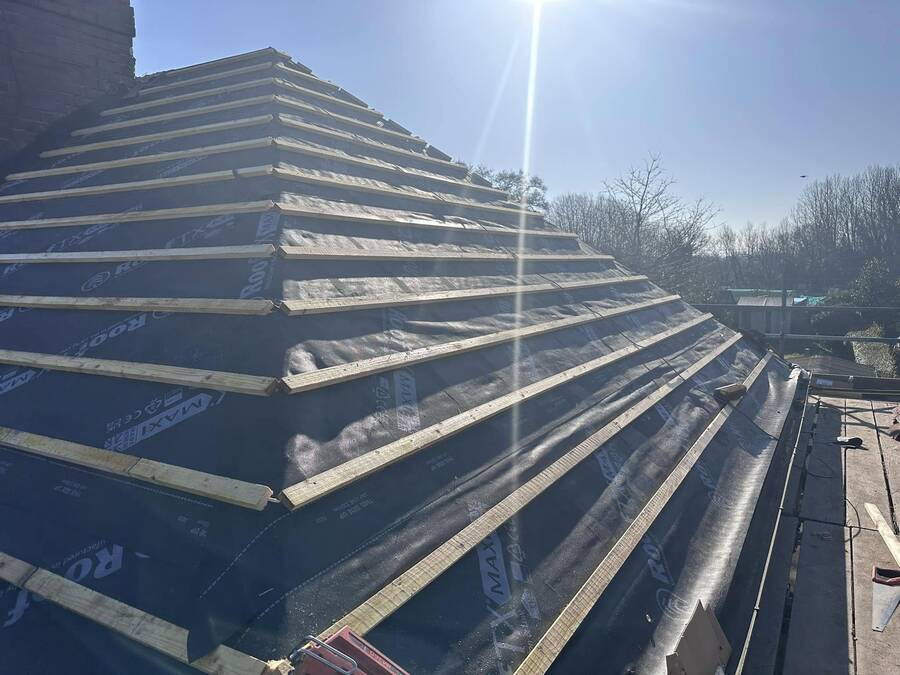 New breathable roofing membrane being fitted