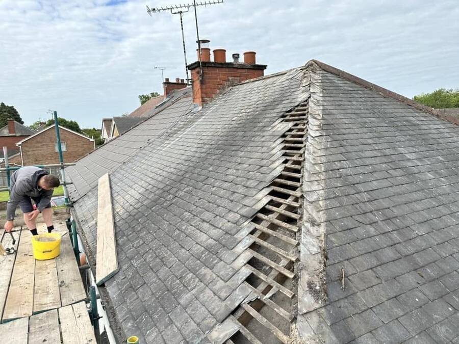 Slate roof repair in progress