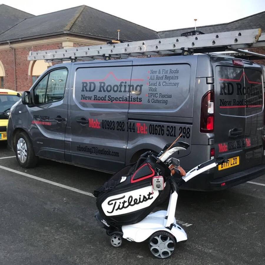 RD Roofing van on site, ready for a job